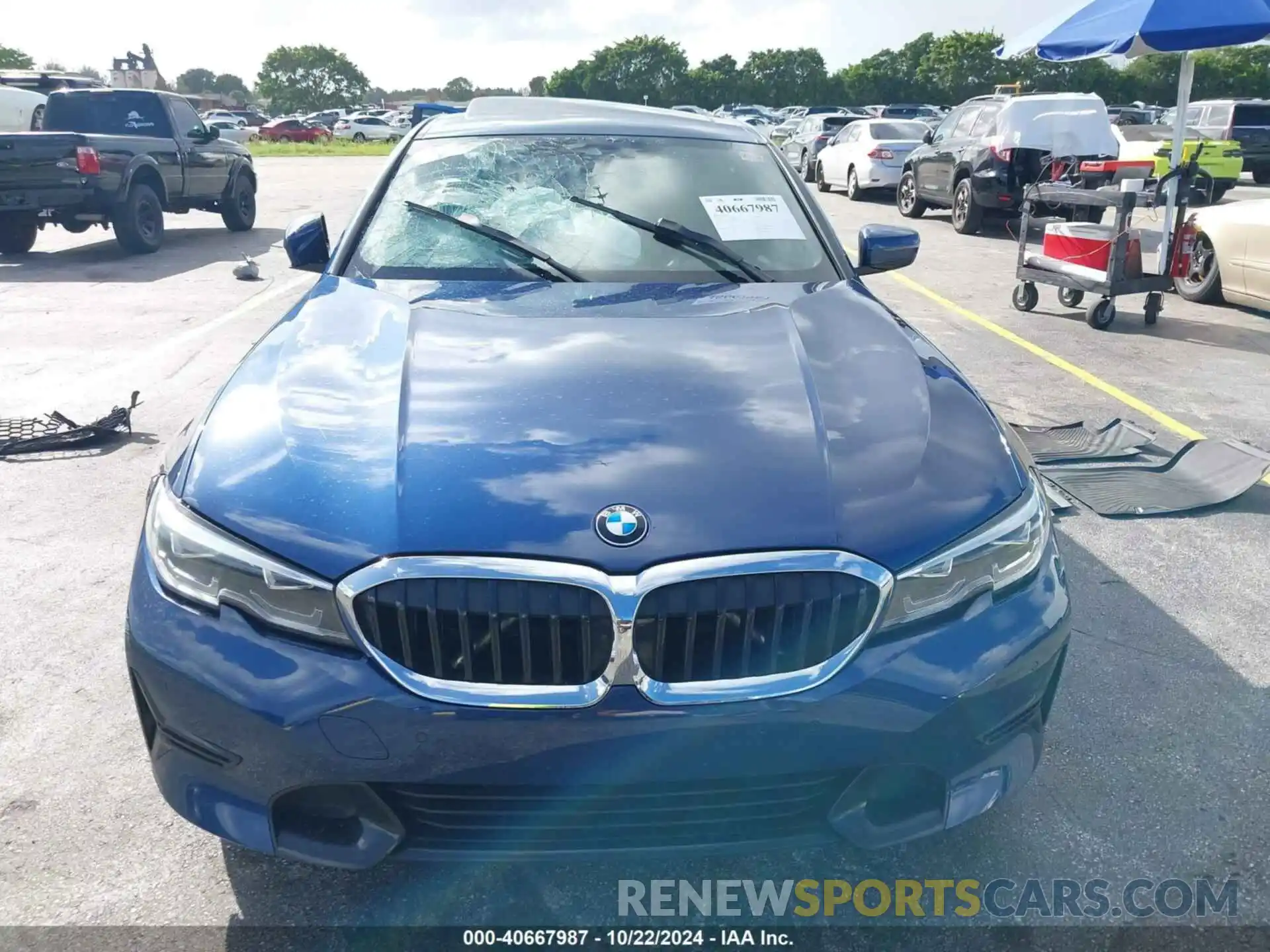 12 Photograph of a damaged car 3MW5R1J02N8C27863 BMW 330I 2022