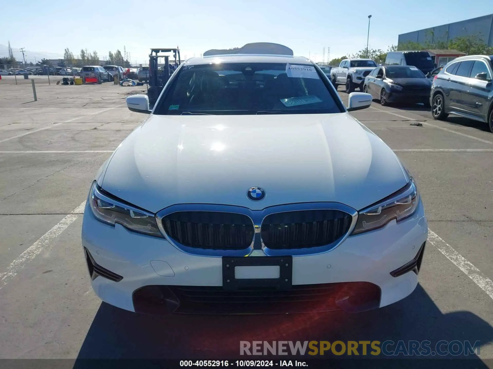 12 Photograph of a damaged car 3MW5R1J02N8C39933 BMW 330I 2022