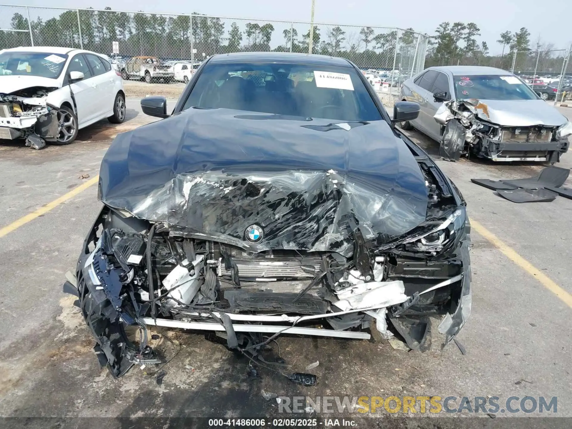 12 Photograph of a damaged car 3MW5R1J06N8C36291 BMW 330I 2022