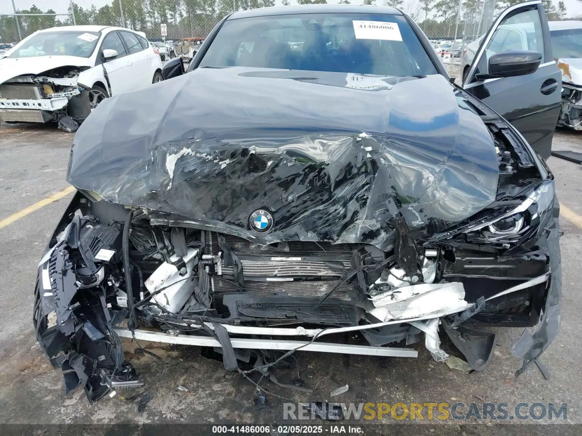 6 Photograph of a damaged car 3MW5R1J06N8C36291 BMW 330I 2022