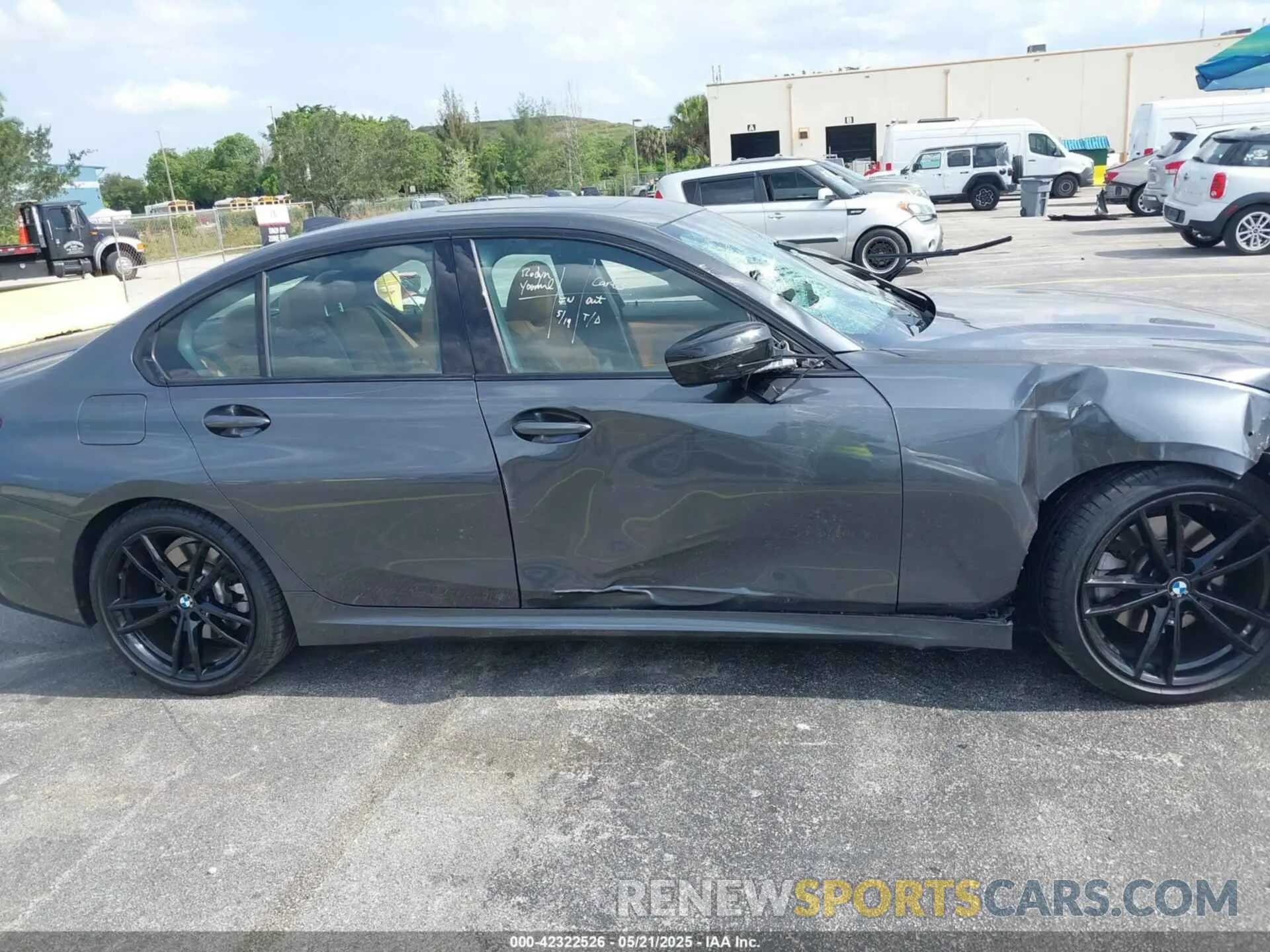 13 Photograph of a damaged car 3MW5R1J0XN8C41168 BMW 330I 2022