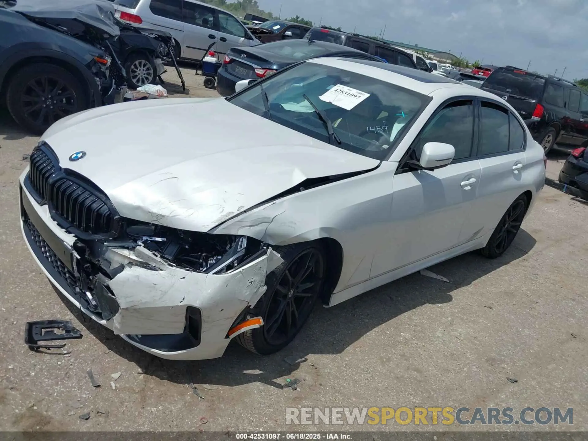 2 Photograph of a damaged car 3MW69FF03P8D11459 BMW 330I 2023