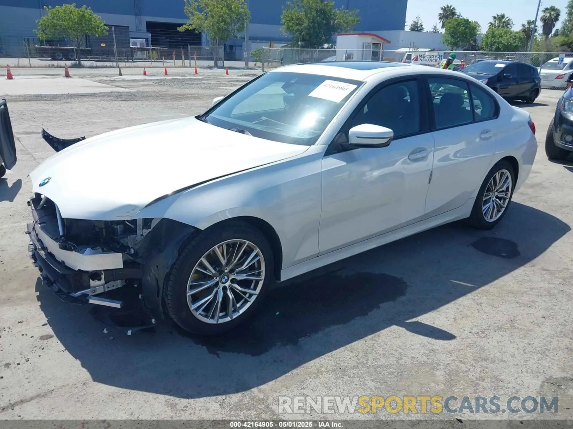 2 Photograph of a damaged car 3MW69FF07P8D18303 BMW 330I 2023