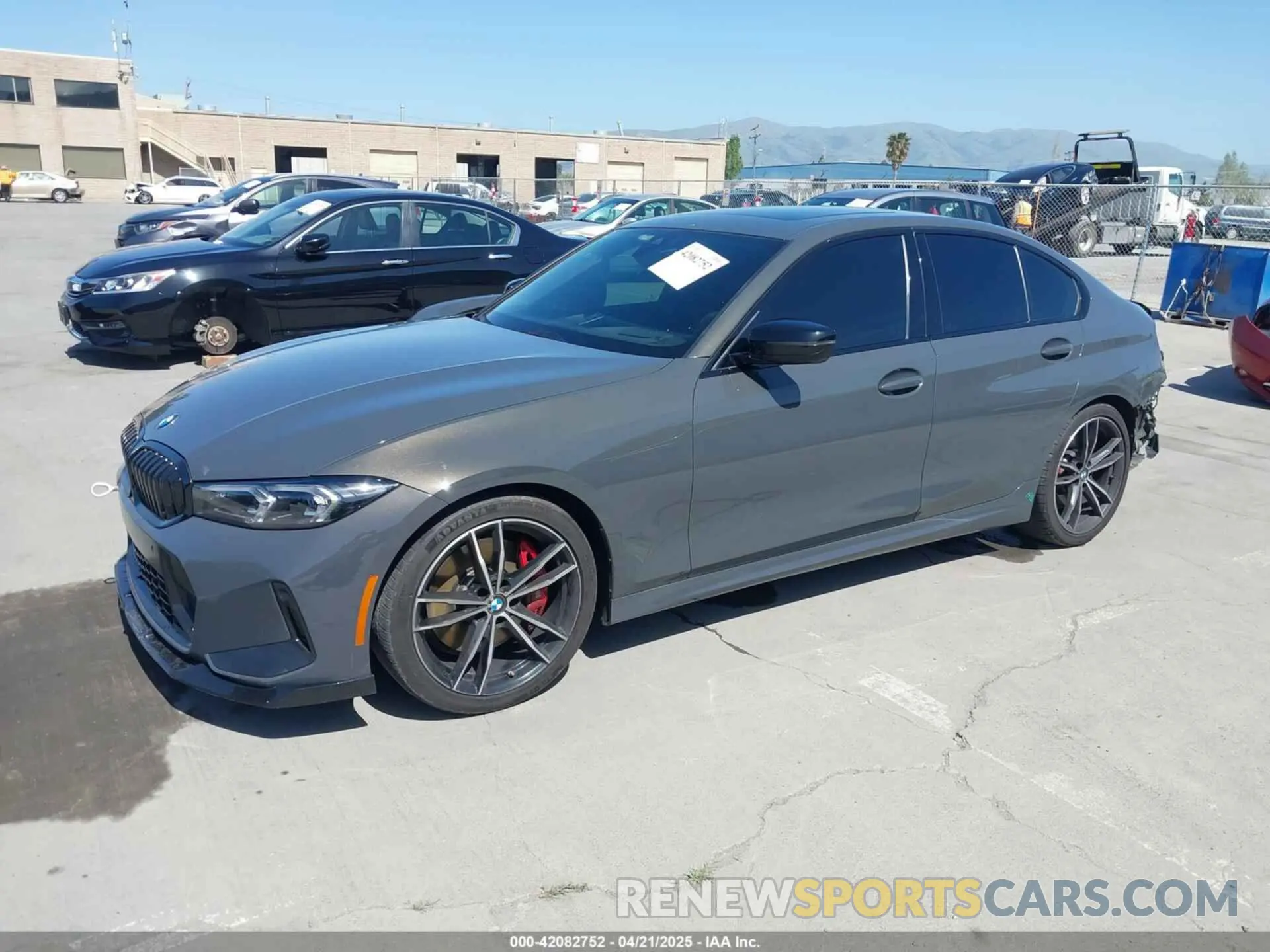 2 Photograph of a damaged car 3MW69FF08P8C94593 BMW 330I 2023