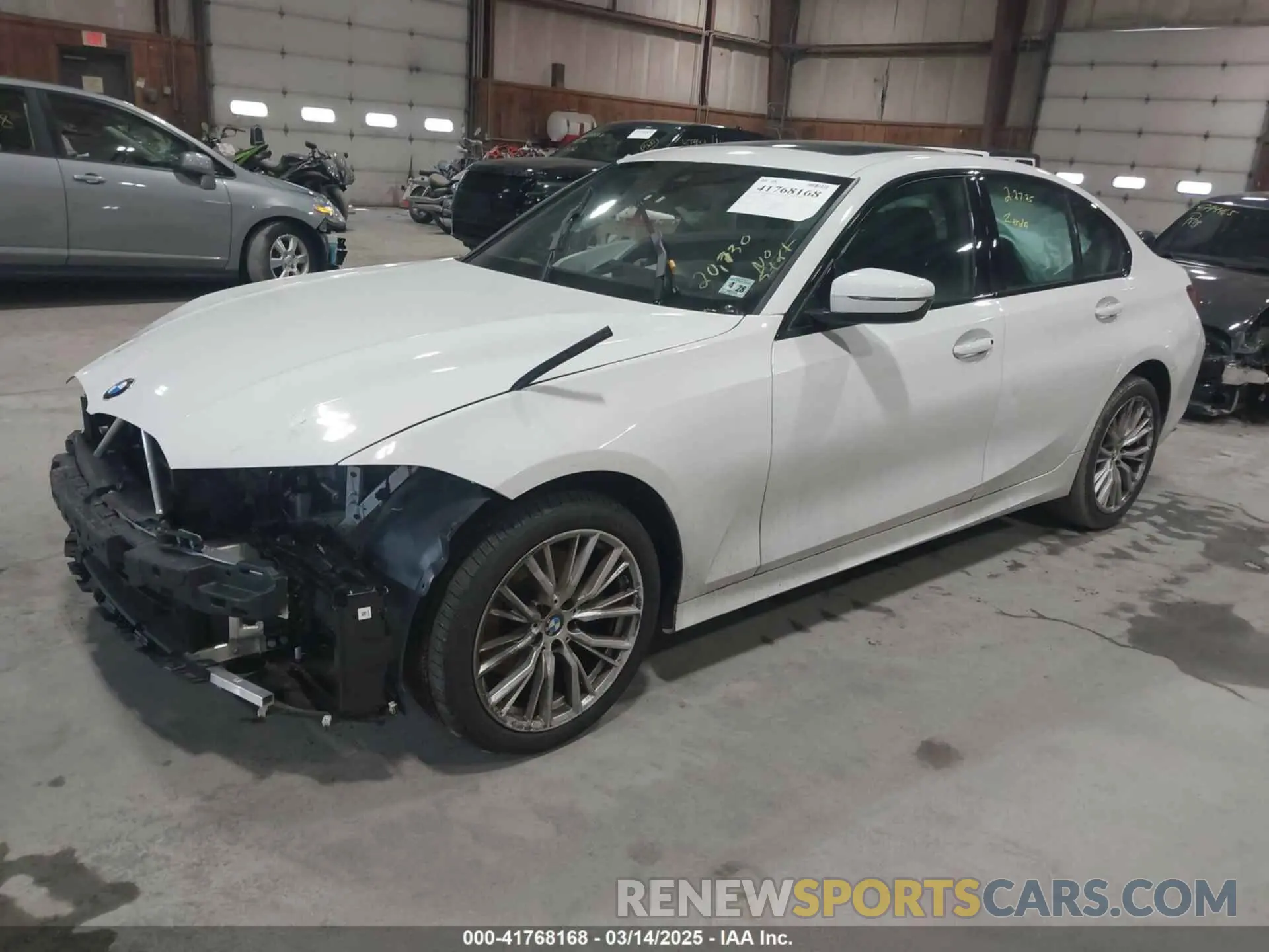 2 Photograph of a damaged car 3MW89FF04P8D68374 BMW 330I 2023