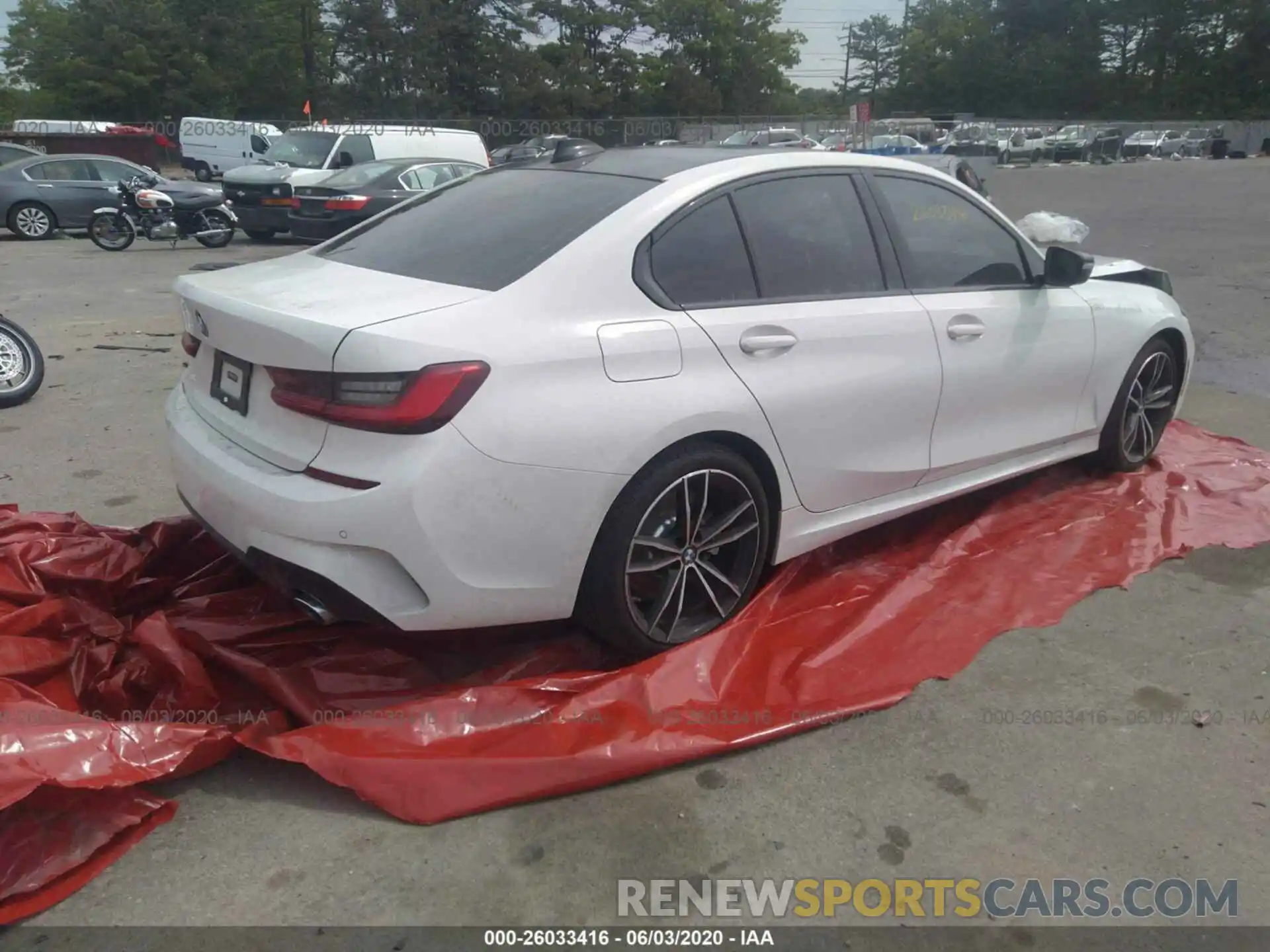 4 Photograph of a damaged car WBA5R7C53KAJ80659 BMW 330XI 2019