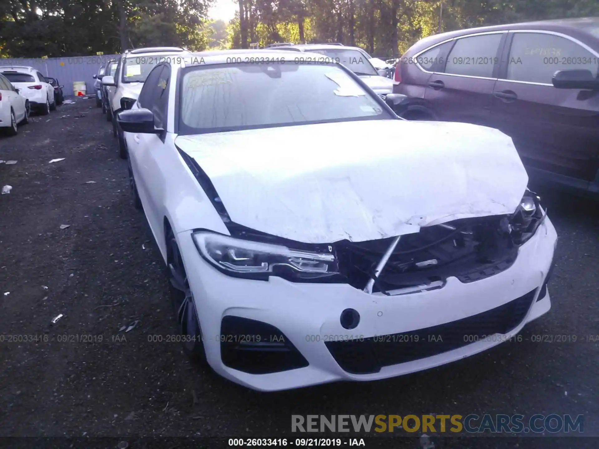 6 Photograph of a damaged car WBA5R7C53KAJ80659 BMW 330XI 2019