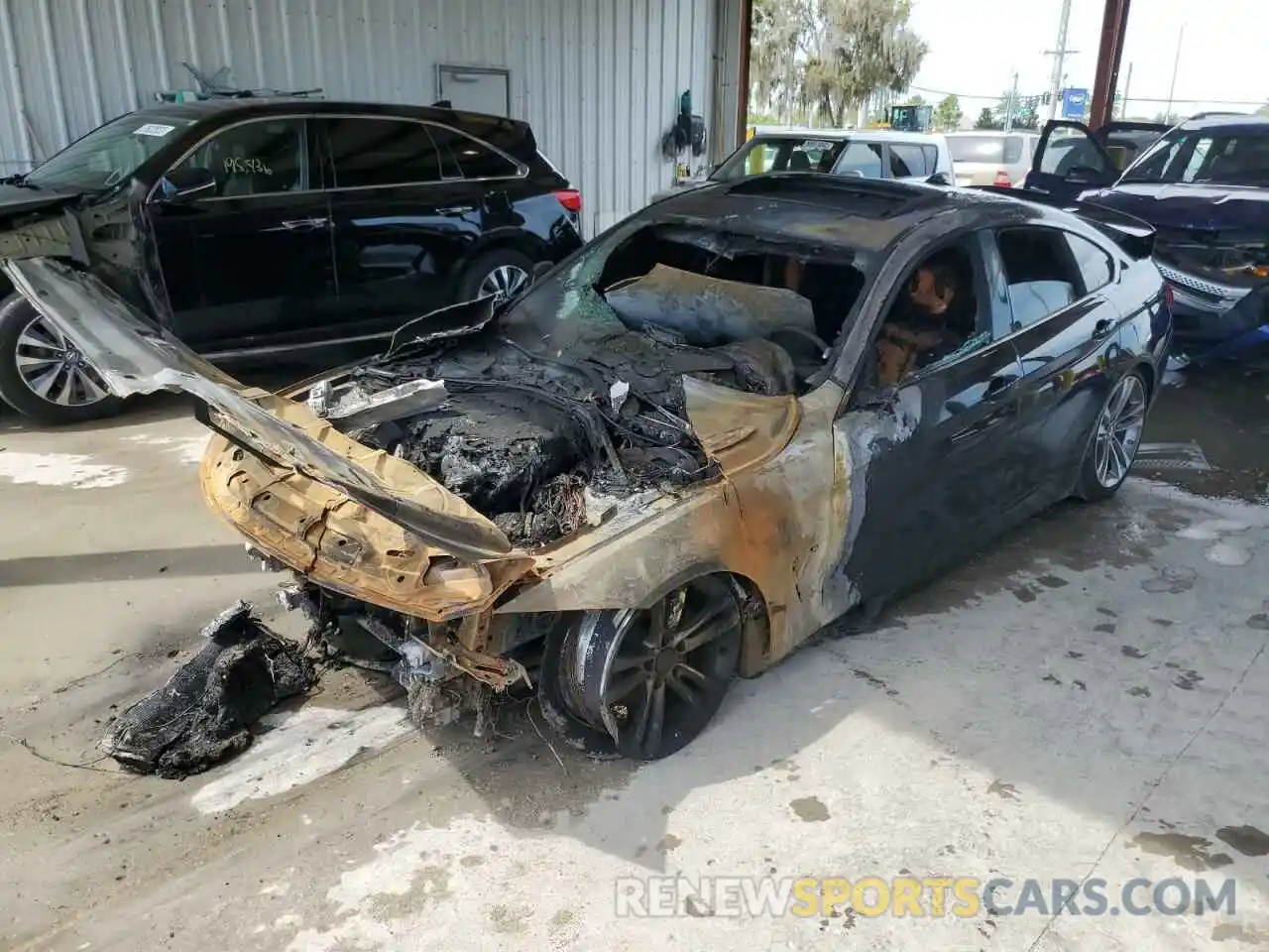 2 Photograph of a damaged car WBA4J1C50KBM17358 BMW 4 SERIES 2019