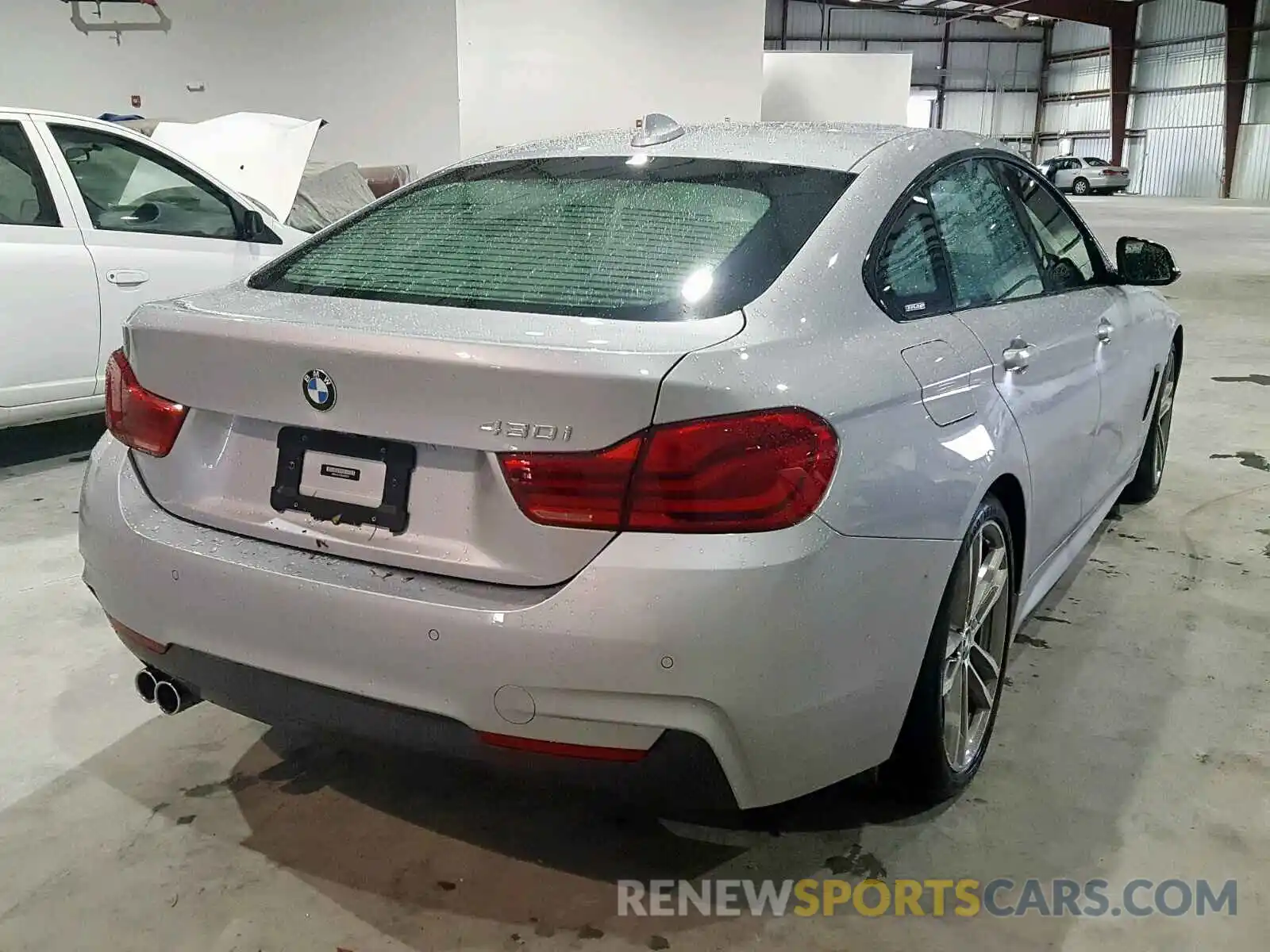 4 Photograph of a damaged car WBA4J1C51KBM18275 BMW 4 SERIES 2019