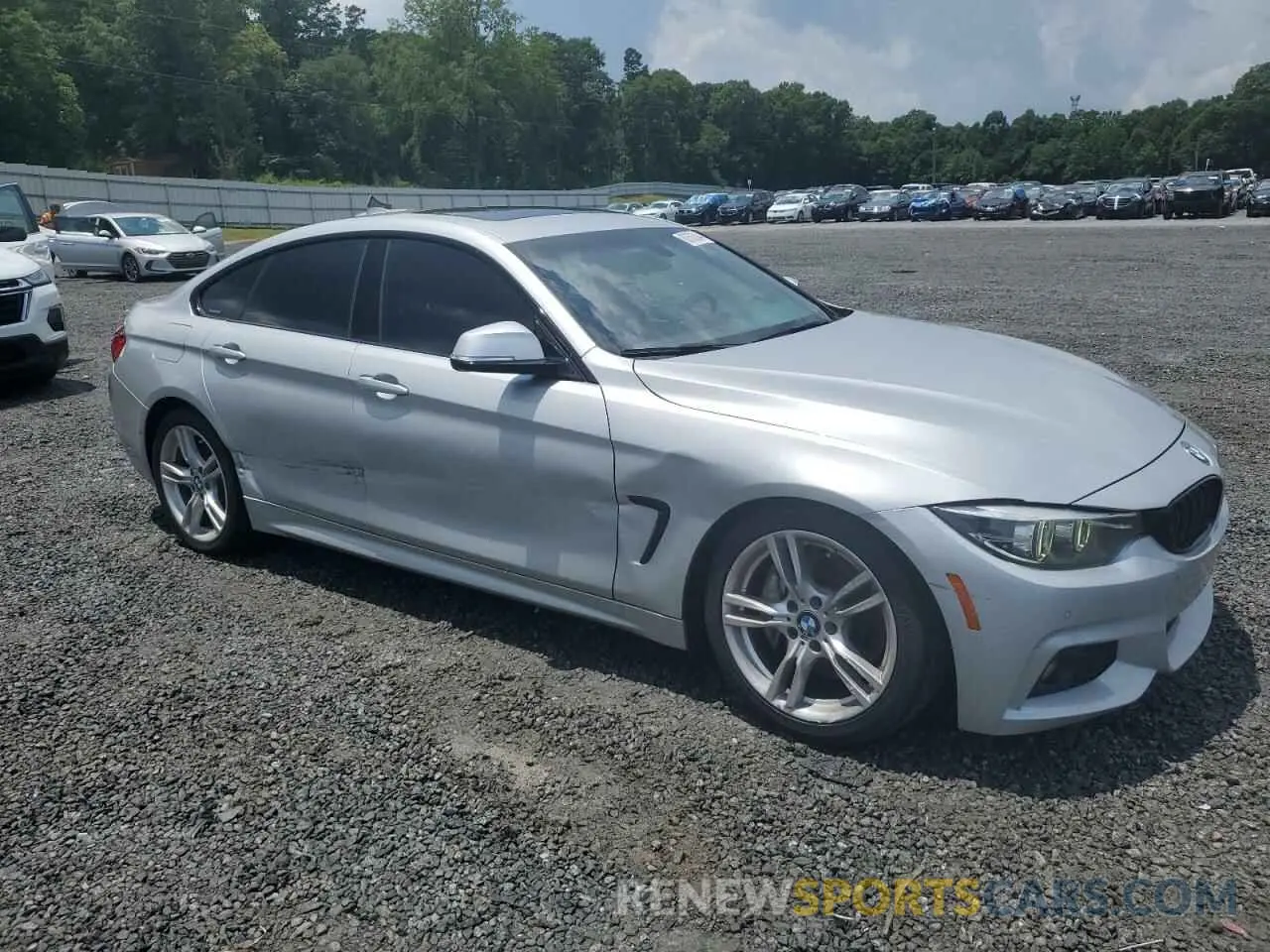 4 Photograph of a damaged car WBA4J1C57KBM14568 BMW 4 SERIES 2019