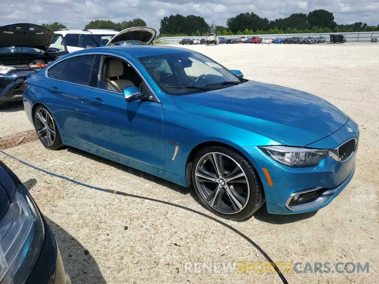 4 Photograph of a damaged car WBA4J1C59KBM18024 BMW 4 SERIES 2019