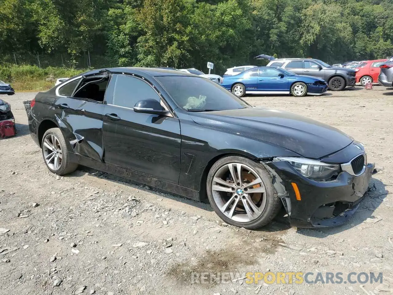 4 Photograph of a damaged car WBA4J3C57KBL08312 BMW 4 SERIES 2019