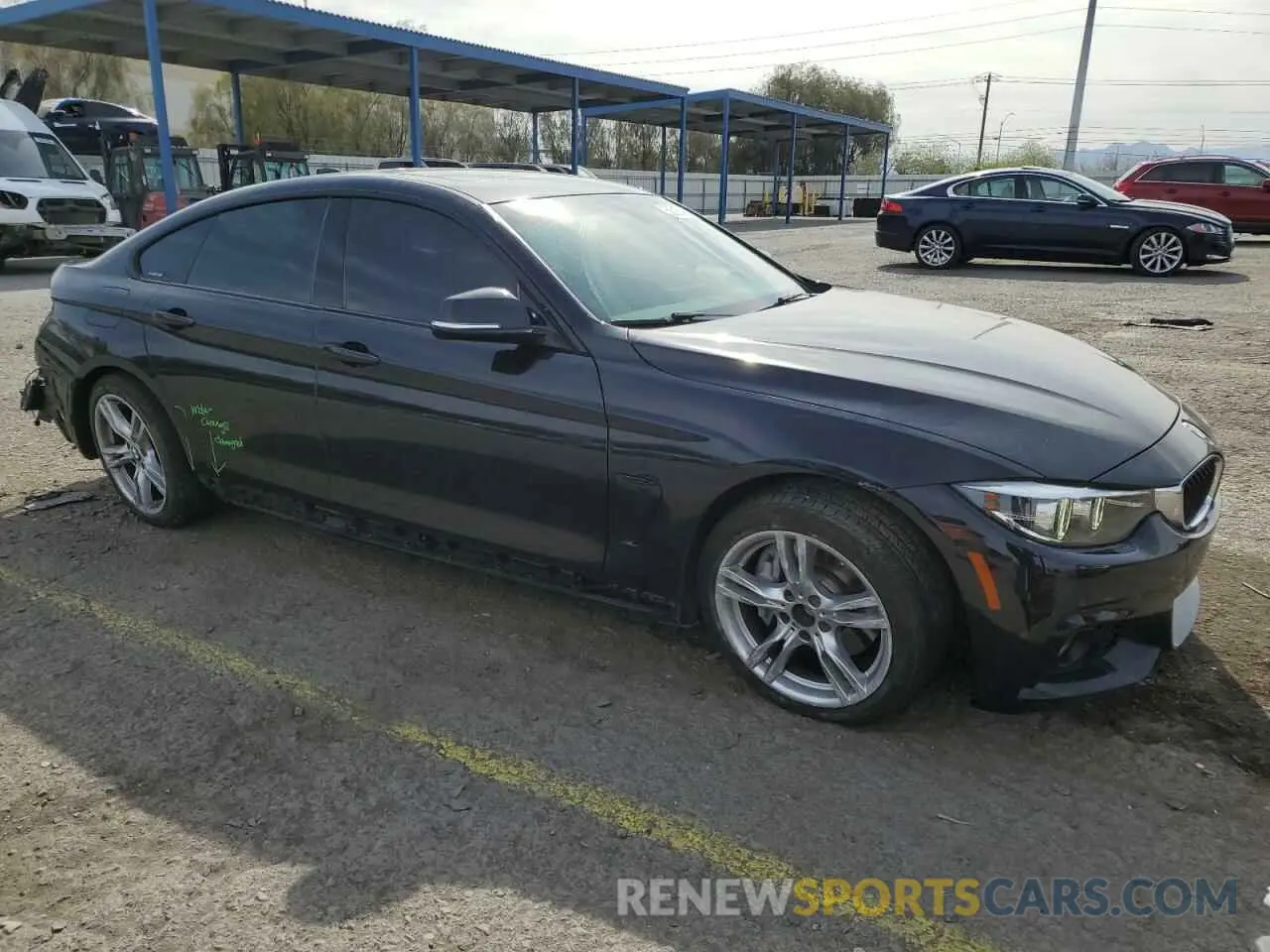 4 Photograph of a damaged car WBA4J7C5XKBM75903 BMW 4 SERIES 2019