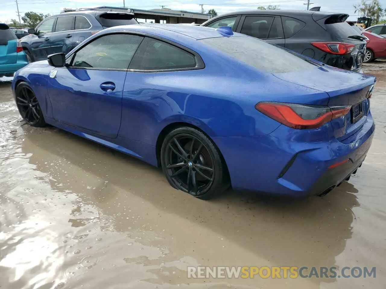 2 Photograph of a damaged car WBA53AP0XMCG52296 BMW 4 SERIES 2021