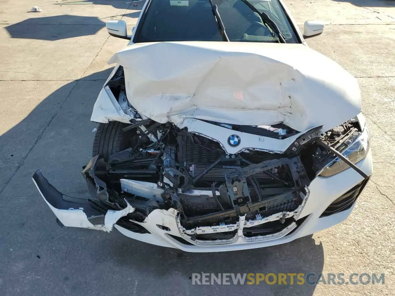 11 Photograph of a damaged car WBA43AT05NCK84528 BMW 4 SERIES 2022