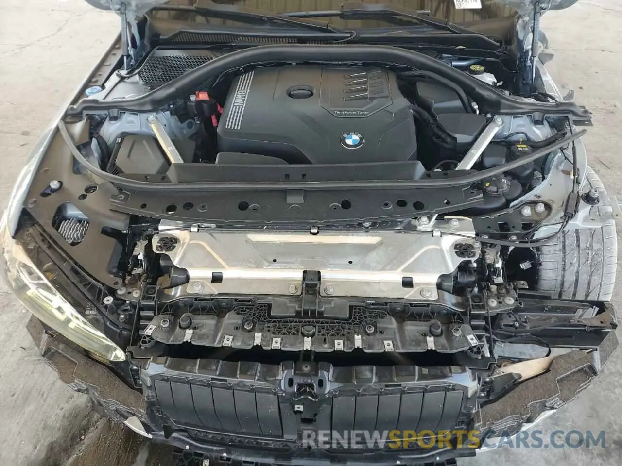 12 Photograph of a damaged car WBA53AP02NCK07114 BMW 4 SERIES 2022