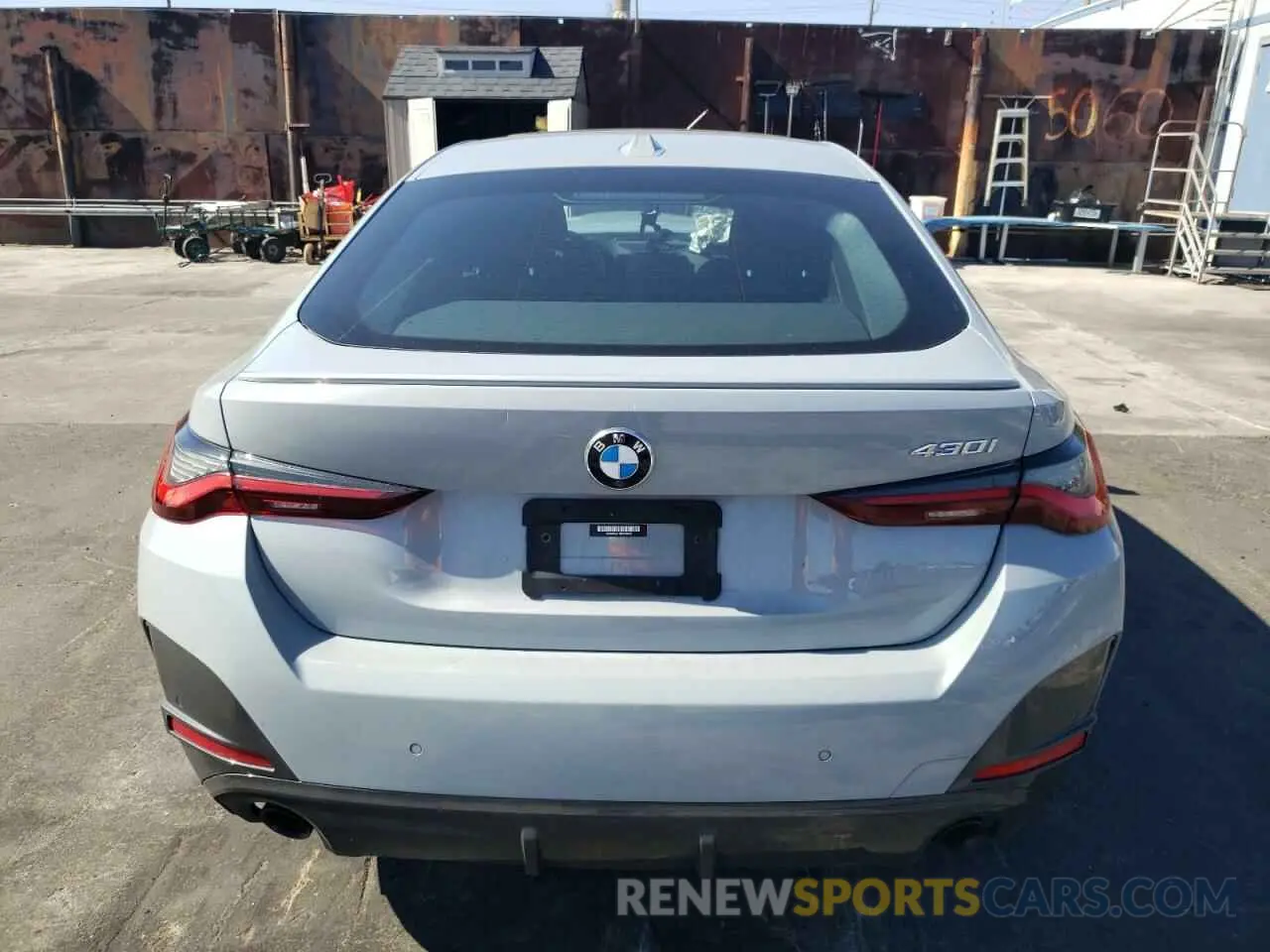 6 Photograph of a damaged car WBA63AV01NFM70409 BMW 4 SERIES 2022