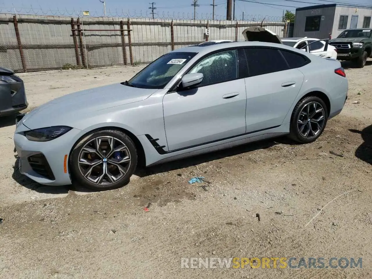 1 Photograph of a damaged car WBA63AV07NFM04916 BMW 4 SERIES 2022