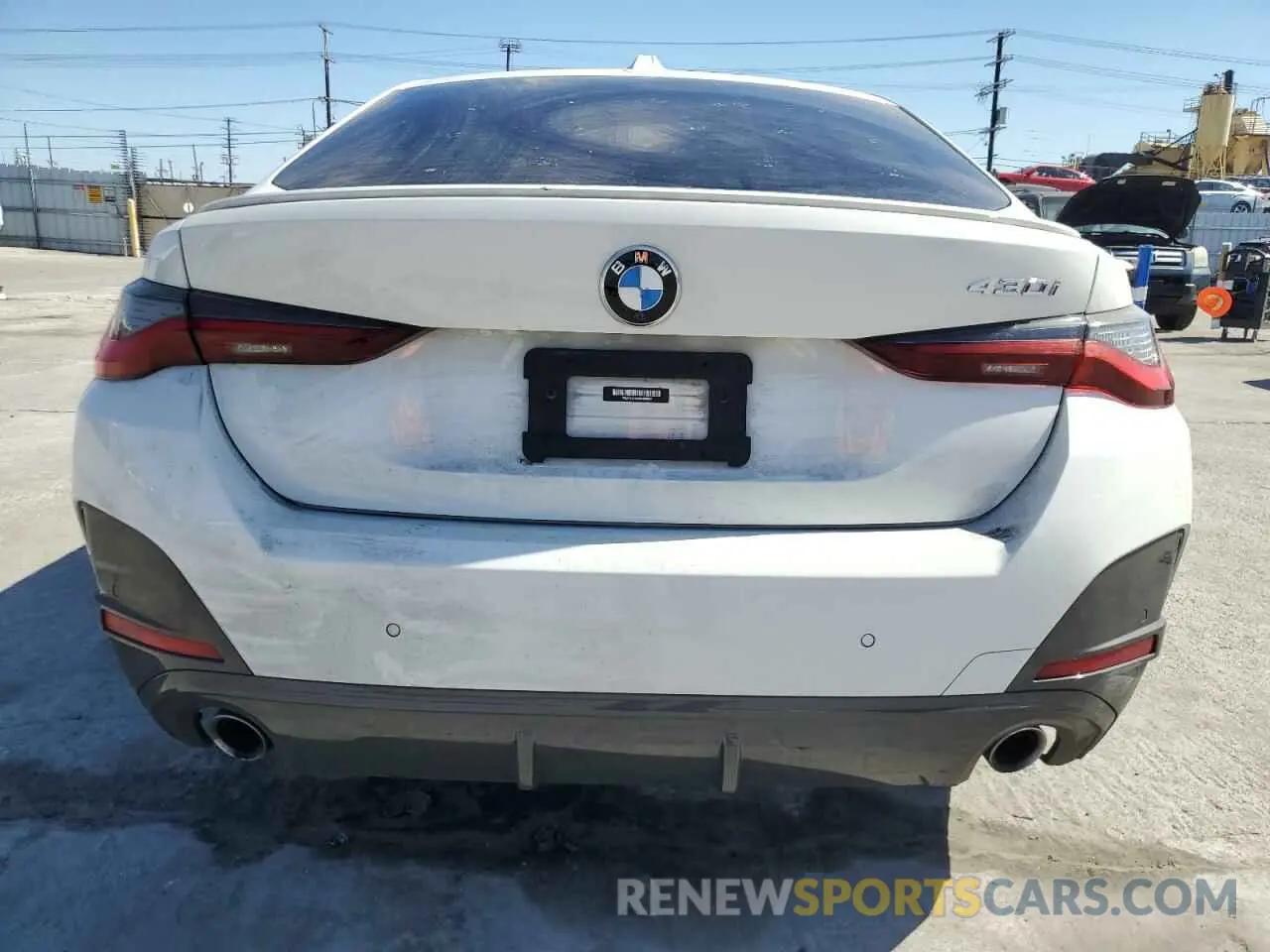 6 Photograph of a damaged car WBA63AV09NFM36850 BMW 4 SERIES 2022