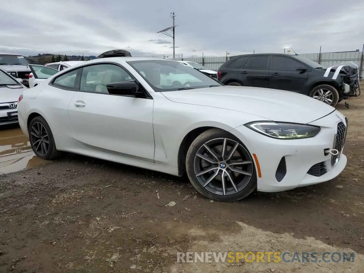 4 Photograph of a damaged car WBA73AP01NCH62891 BMW 4 SERIES 2022