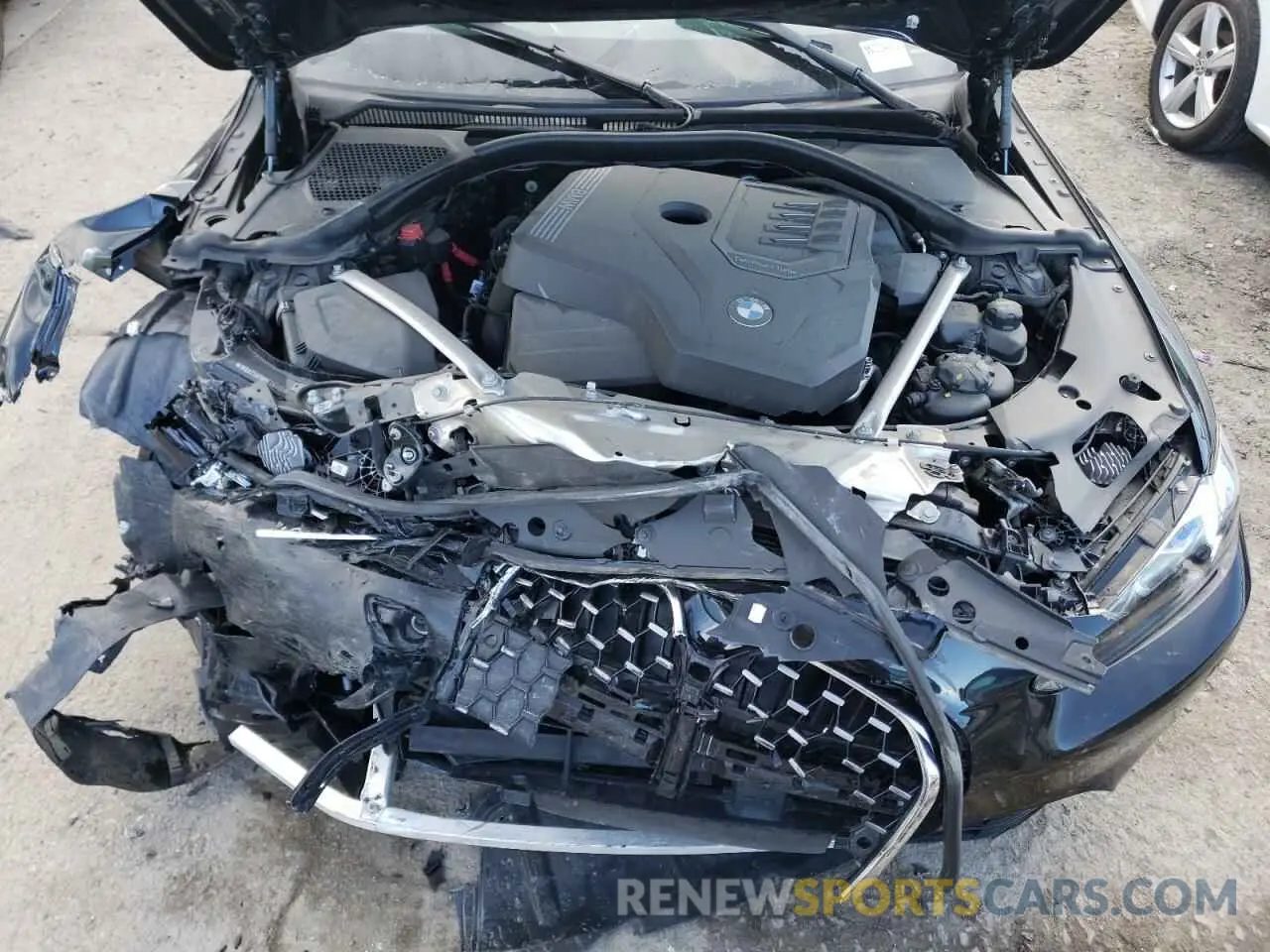 11 Photograph of a damaged car WBA73AP08NCJ14493 BMW 4 SERIES 2022