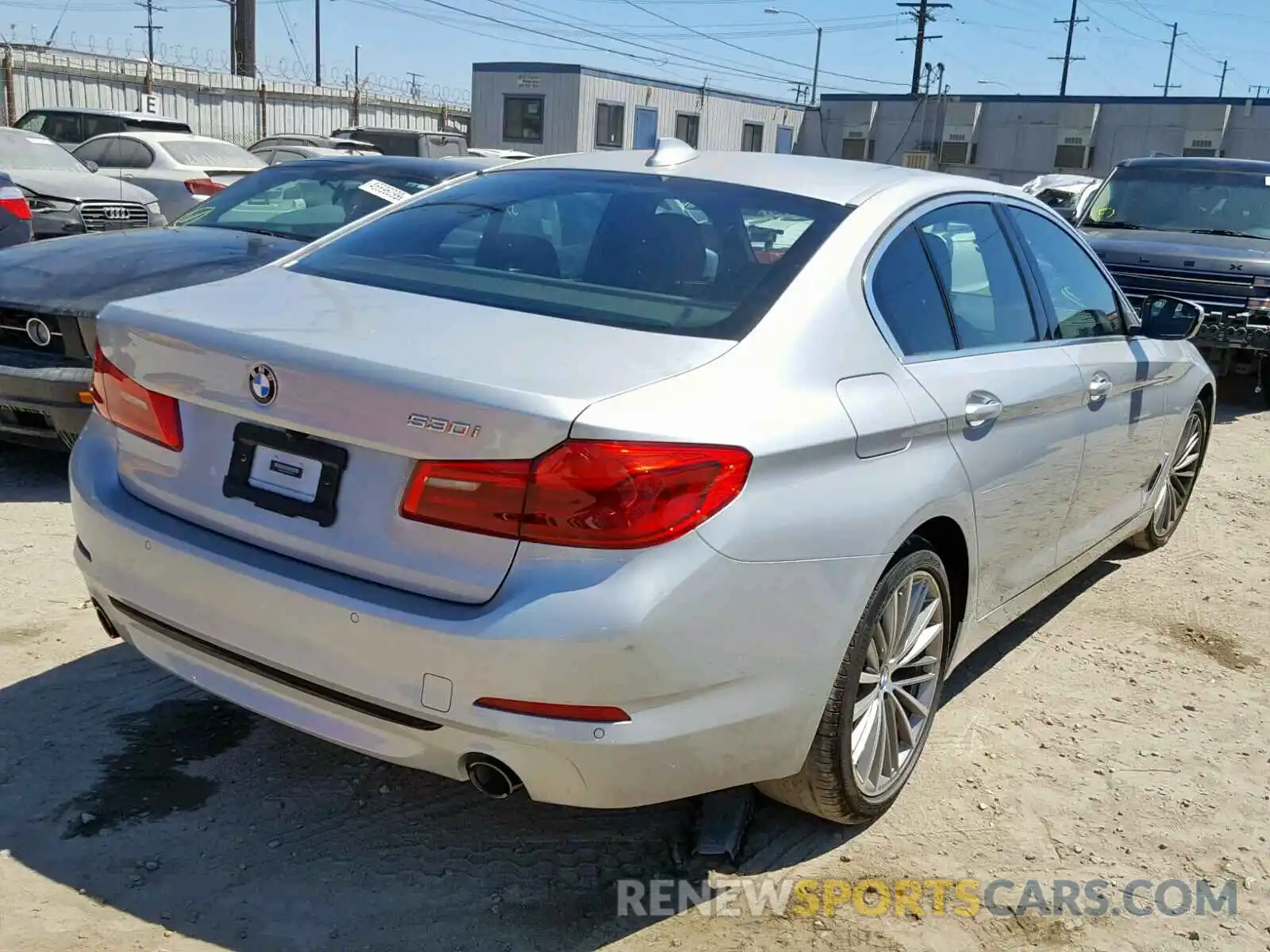 4 Photograph of a damaged car WBAJA5C54KWW41378 BMW 5 SERIES 2019