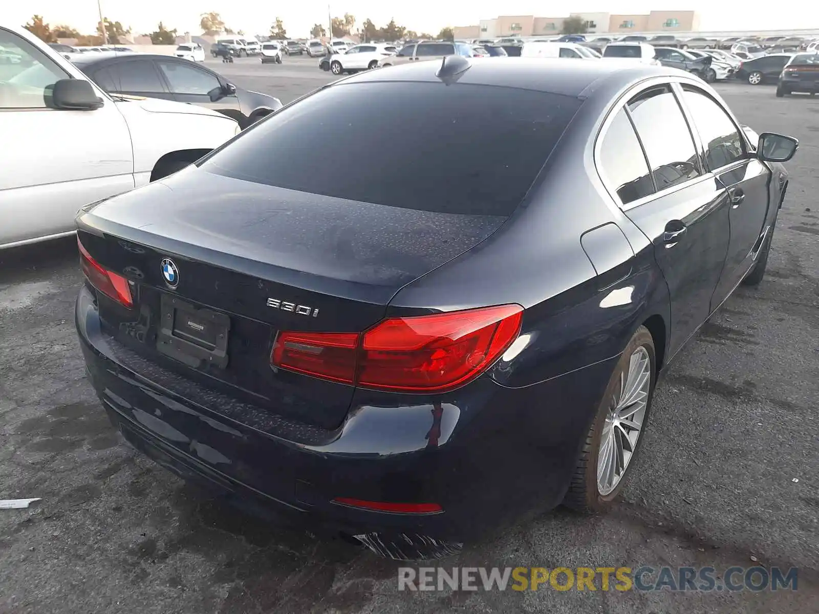 4 Photograph of a damaged car WBAJA5C55KWW10379 BMW 5 SERIES 2019