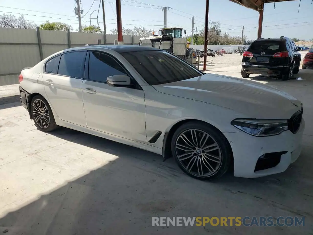 4 Photograph of a damaged car WBAJA5C59KBX88142 BMW 5 SERIES 2019