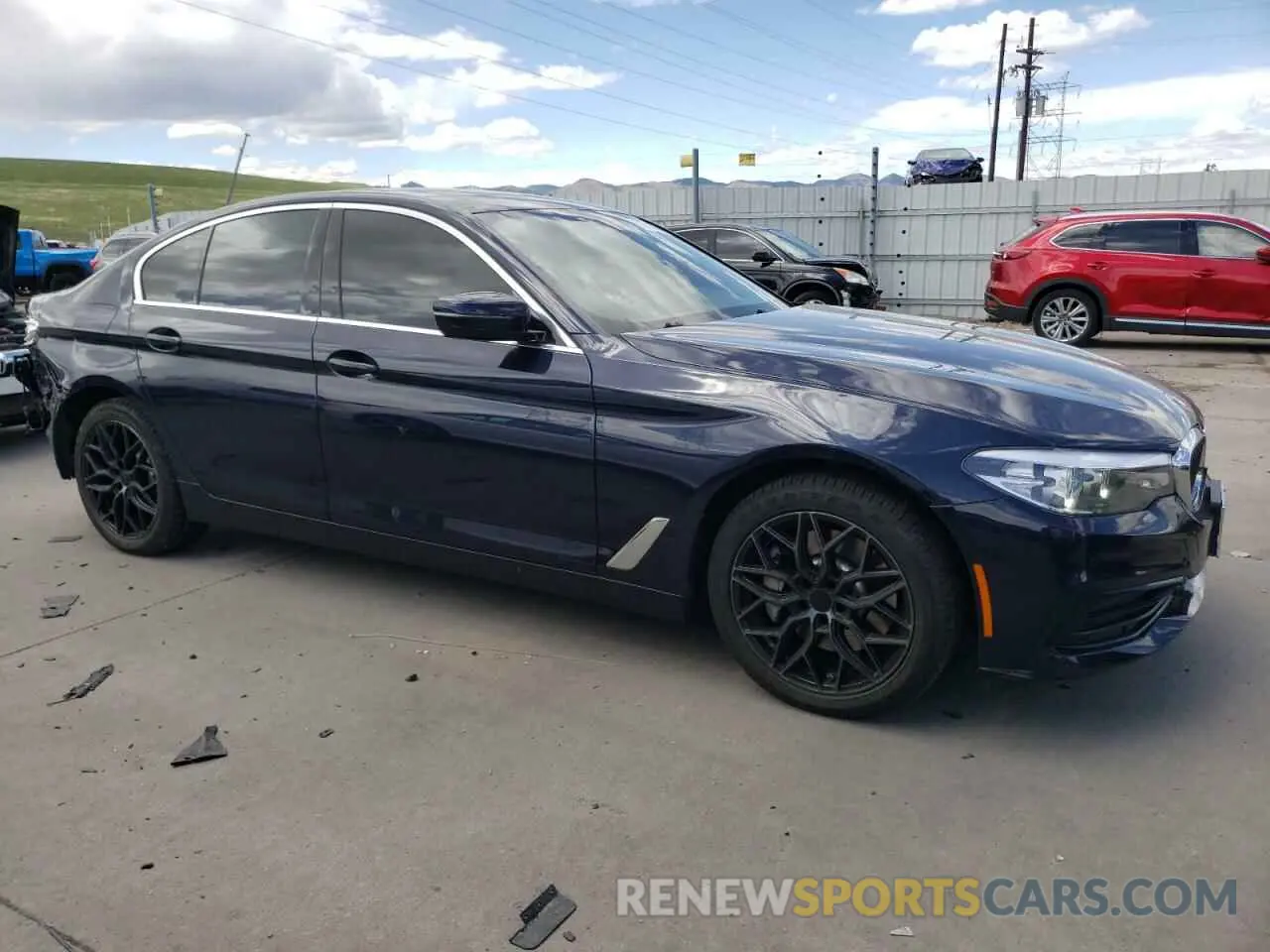 4 Photograph of a damaged car WBAJA7C54KWW25385 BMW 5 SERIES 2019