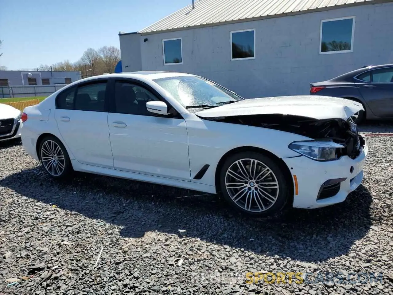 4 Photograph of a damaged car WBAJA7C55KWW49663 BMW 5 SERIES 2019