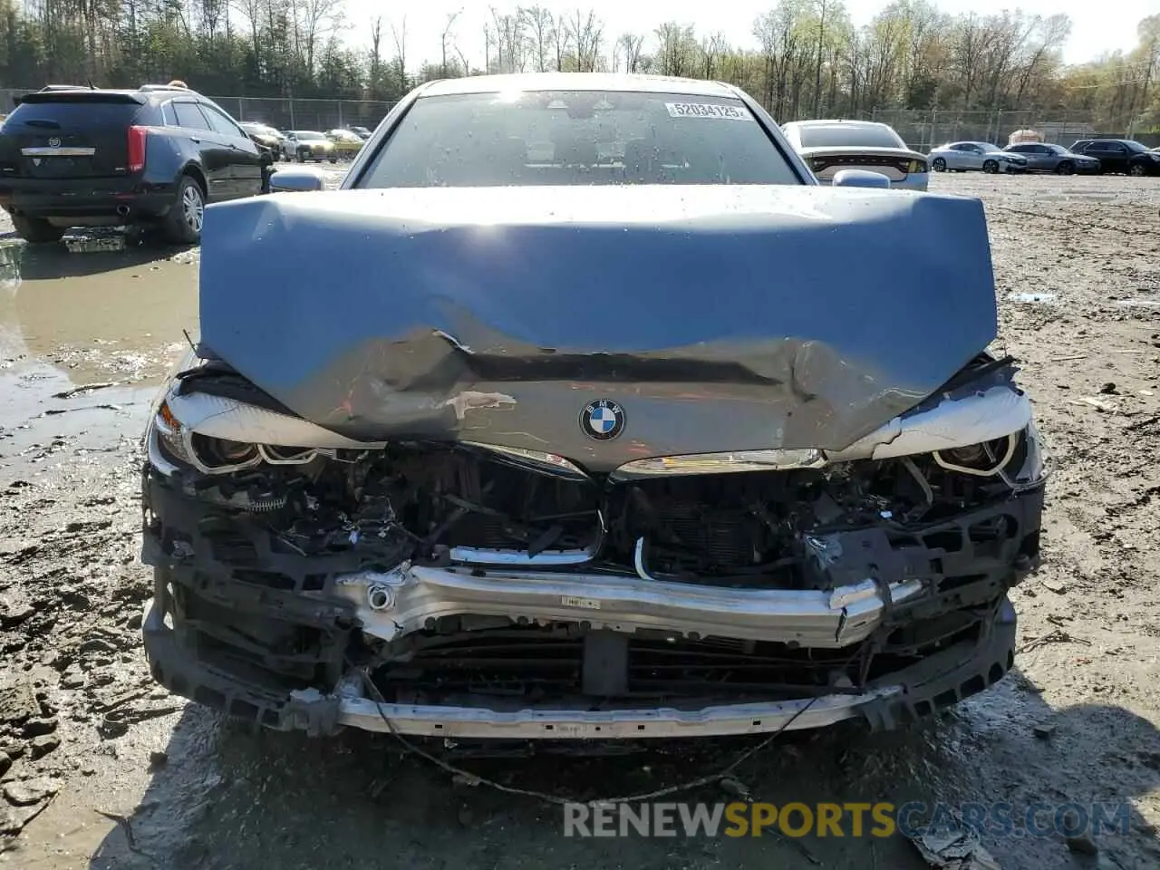 5 Photograph of a damaged car WBAJA9C50KB389398 BMW 5 SERIES 2019