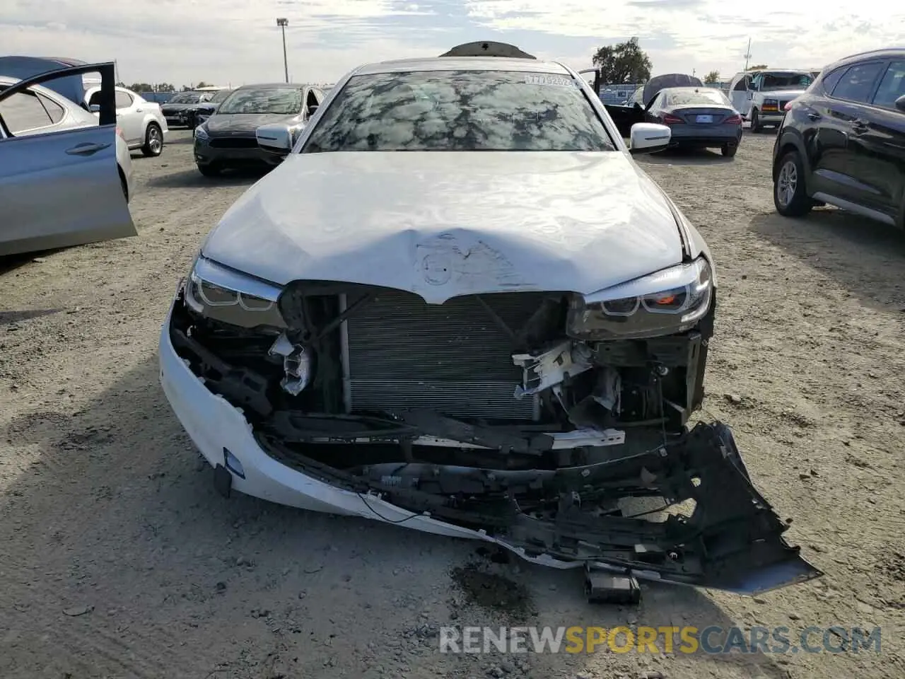 5 Photograph of a damaged car WBAJA9C54KB254585 BMW 5 SERIES 2019