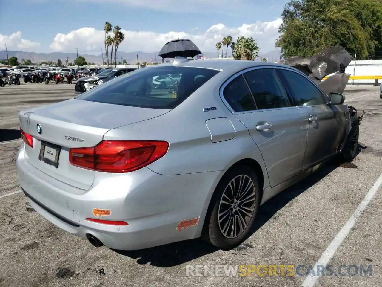 4 Photograph of a damaged car WBAJA9C54KB398833 BMW 5 SERIES 2019