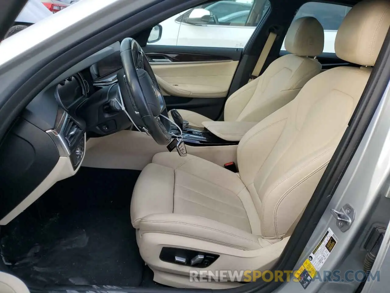 7 Photograph of a damaged car WBAJA9C54KB399240 BMW 5 SERIES 2019