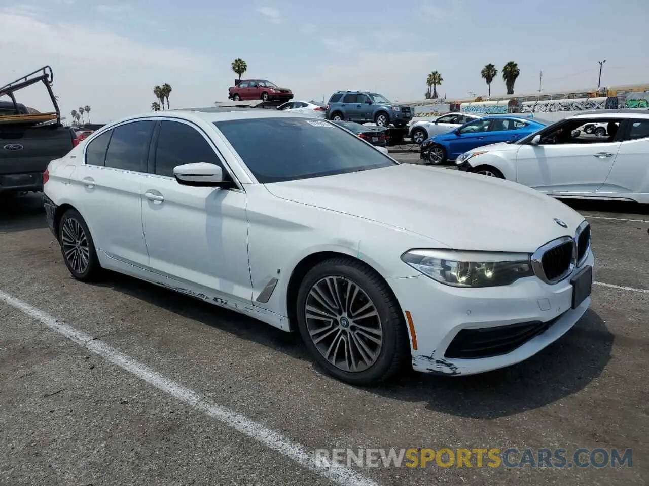 4 Photograph of a damaged car WBAJA9C58KB254671 BMW 5 SERIES 2019