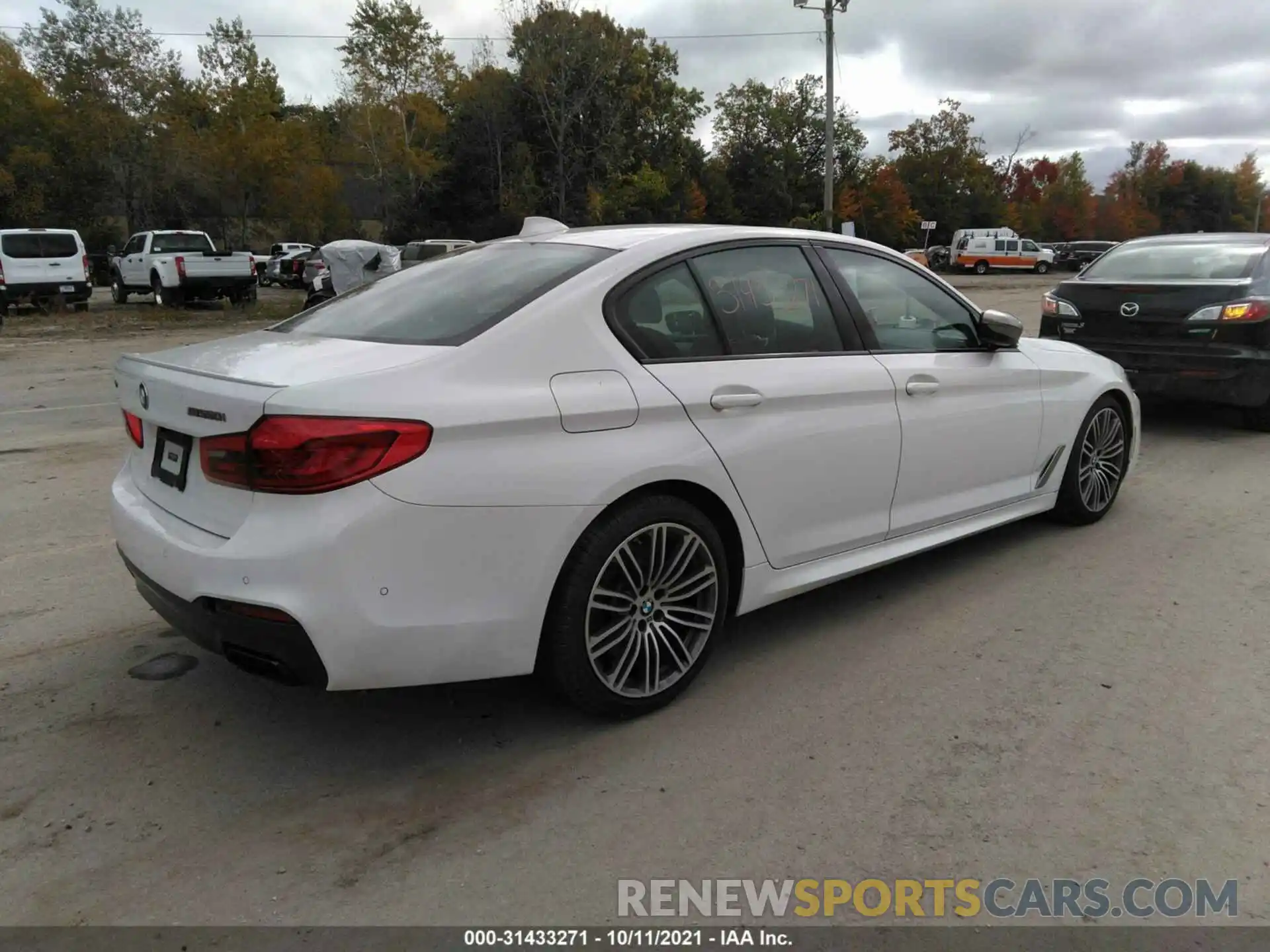 4 Photograph of a damaged car WBAJB9C52KB289087 BMW 5 SERIES 2019