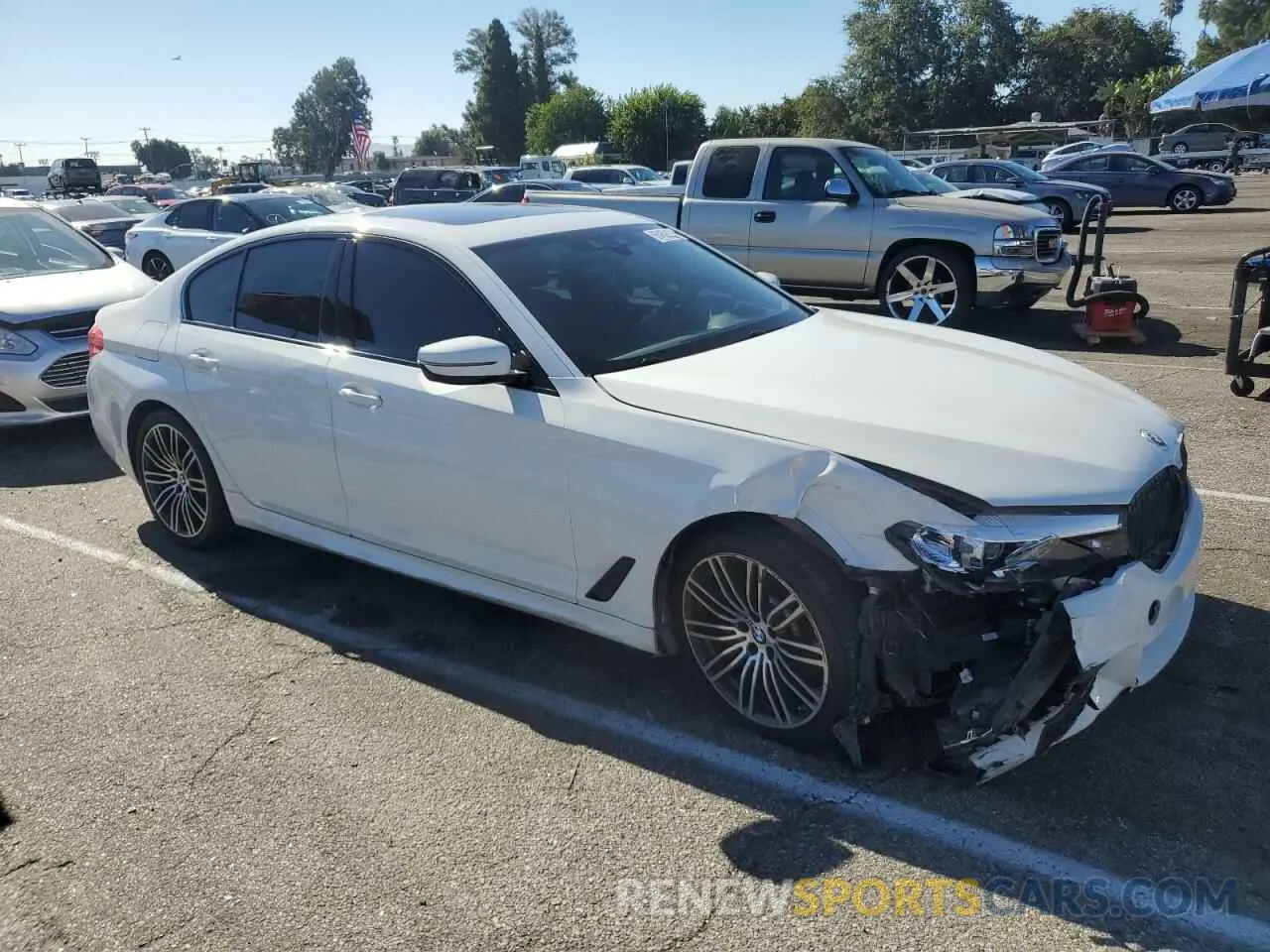 4 Photograph of a damaged car WBAJE5C53KWW43210 BMW 5 SERIES 2019