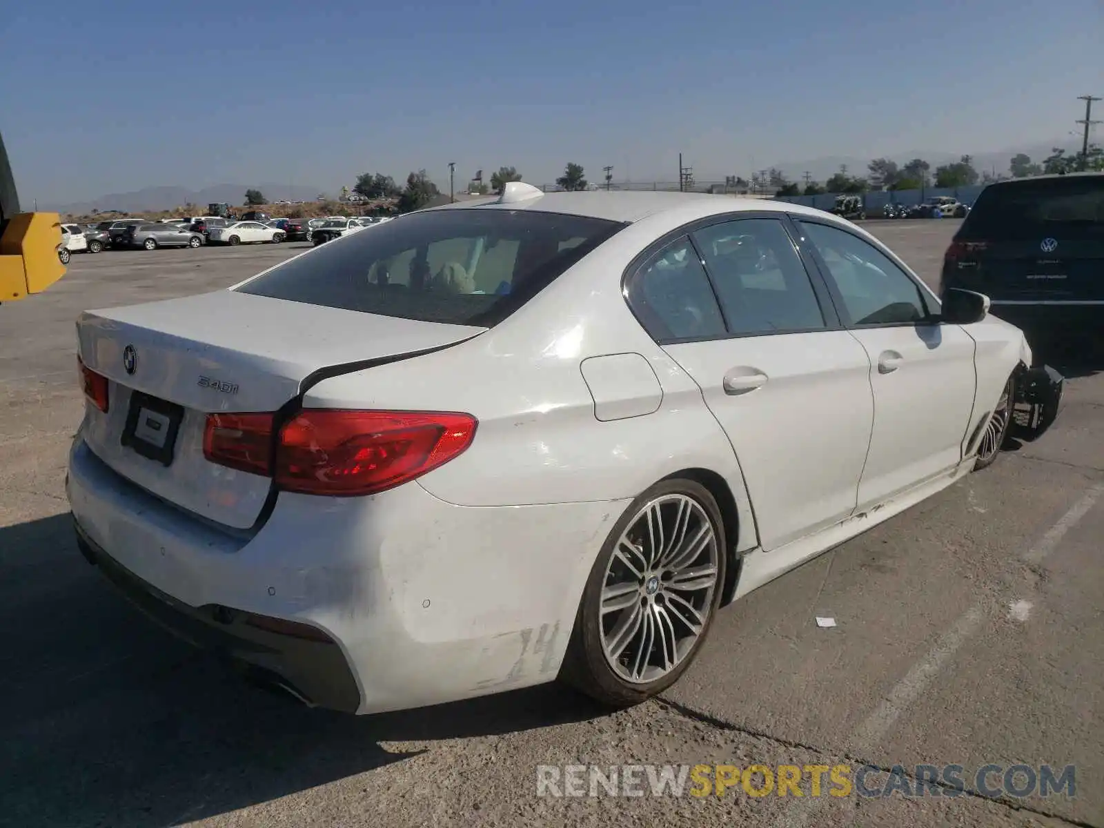 4 Photograph of a damaged car WBAJE5C55KWE66422 BMW 5 SERIES 2019