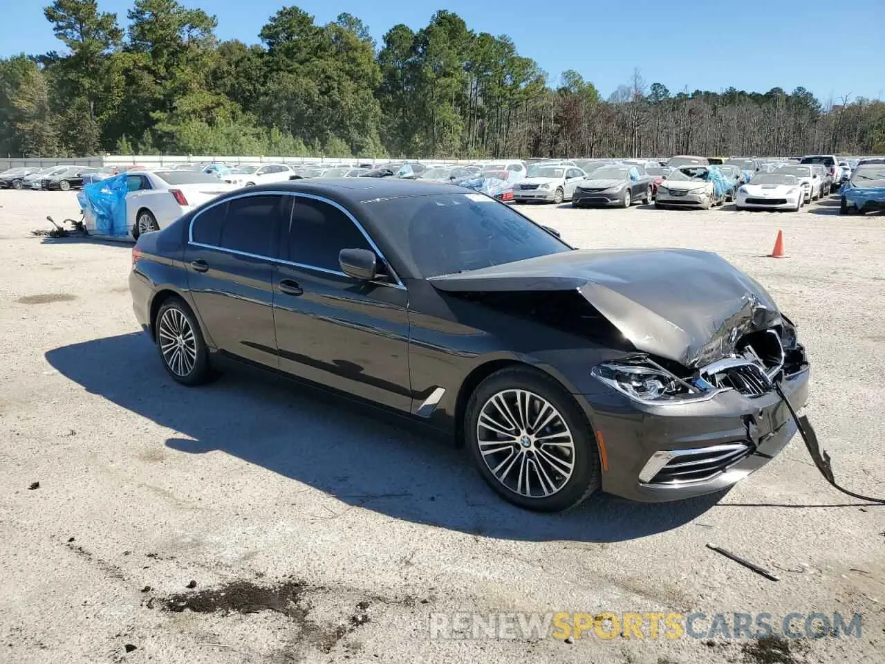 4 Photograph of a damaged car WBAJE5C55KWW06675 BMW 5 SERIES 2019