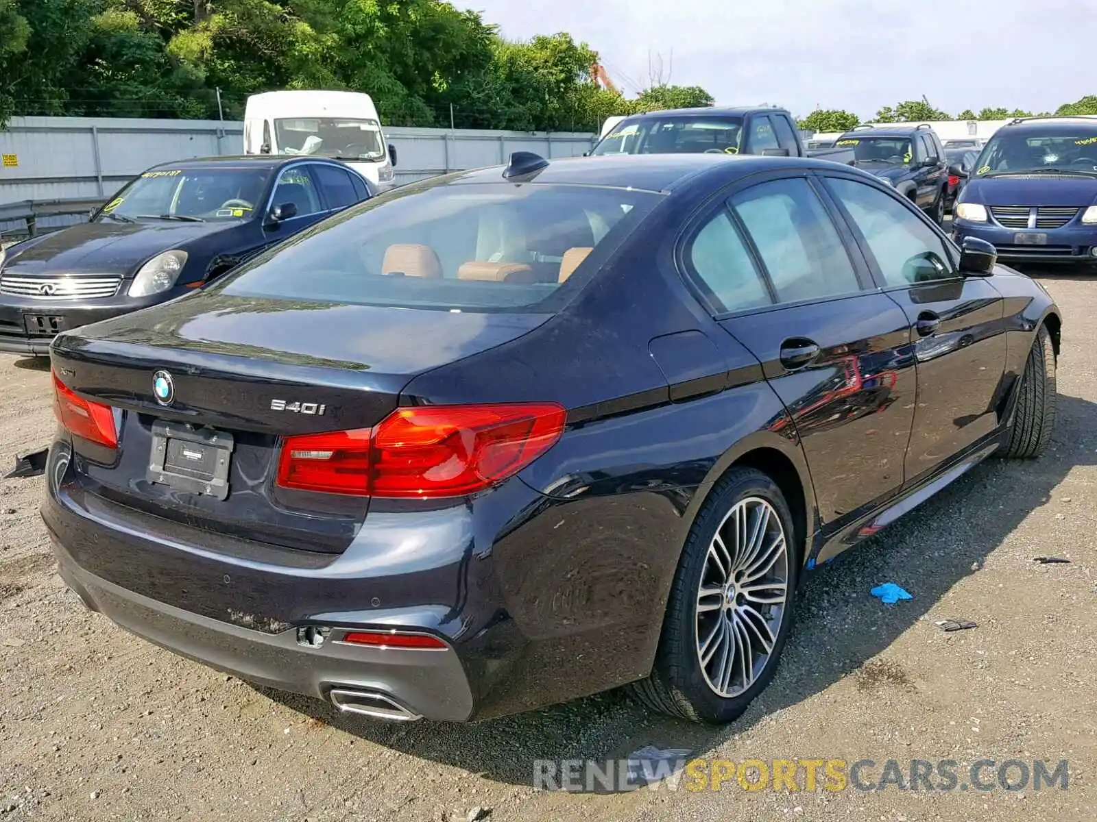 4 Photograph of a damaged car WBAJE7C52KWW11036 BMW 5 SERIES 2019