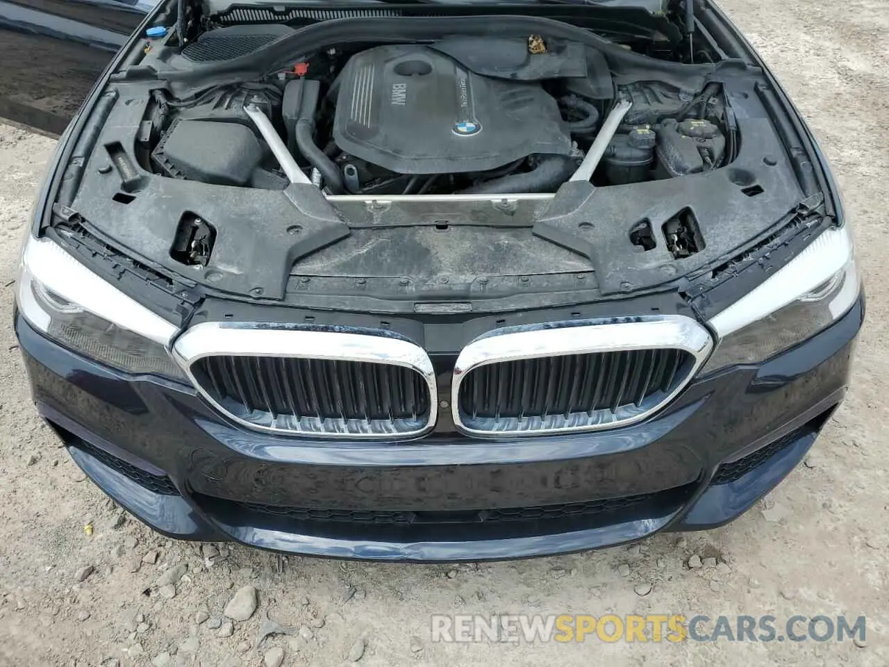 11 Photograph of a damaged car WBAJE7C55KWD55834 BMW 5 SERIES 2019
