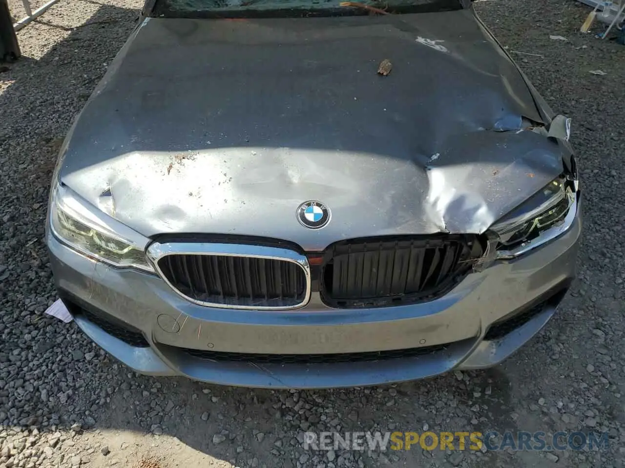 11 Photograph of a damaged car WBAJE7C55KWW18272 BMW 5 SERIES 2019