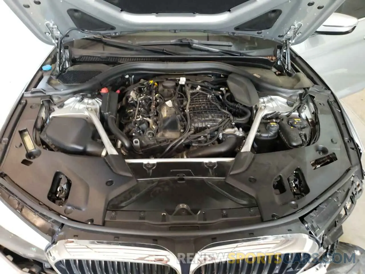 11 Photograph of a damaged car WBAJE7C55KWW45150 BMW 5 SERIES 2019