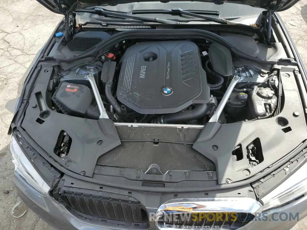 11 Photograph of a damaged car WBAJE7C57KWW10643 BMW 5 SERIES 2019