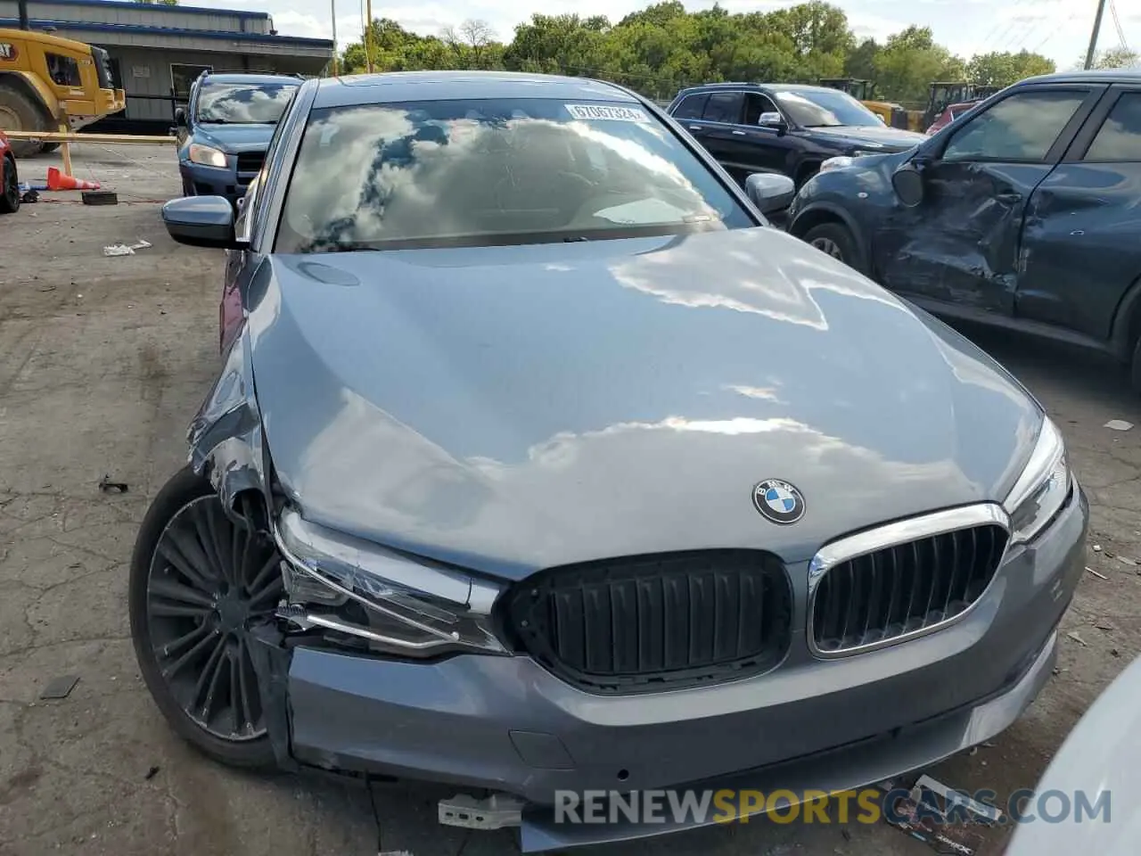 5 Photograph of a damaged car WBAJE7C57KWW10643 BMW 5 SERIES 2019