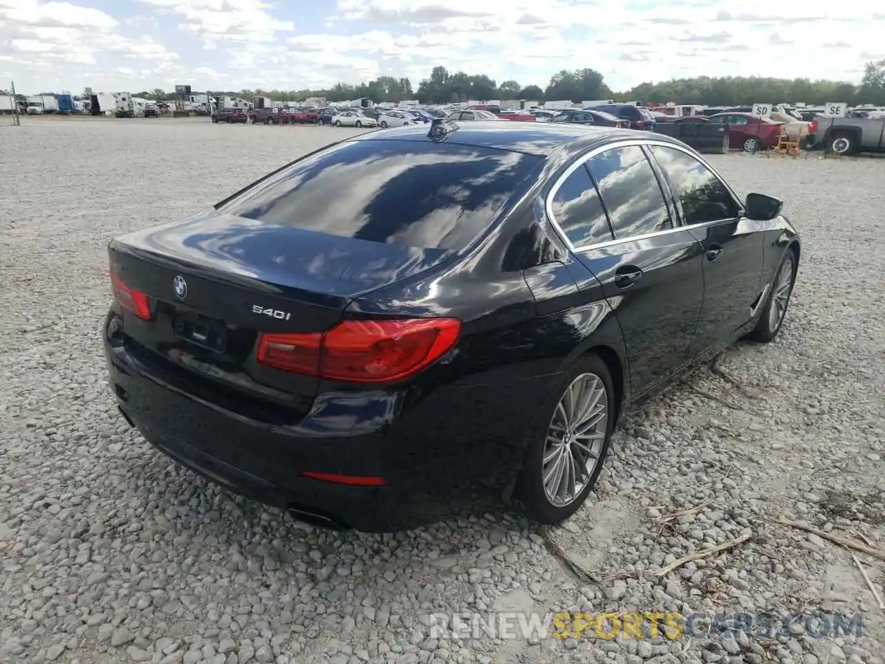 4 Photograph of a damaged car WBAJE7C5XKWD55358 BMW 5 SERIES 2019