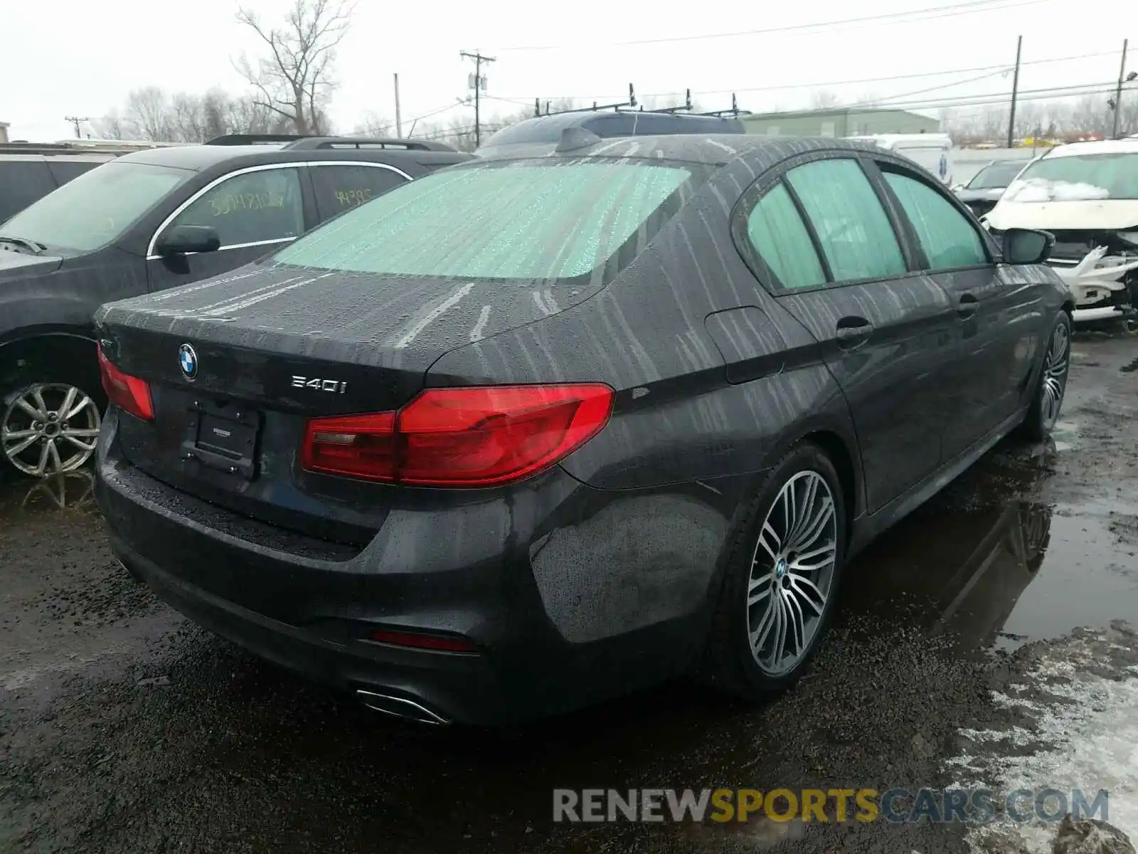 4 Photograph of a damaged car WBAJE7C5XKWW06344 BMW 5 SERIES 2019