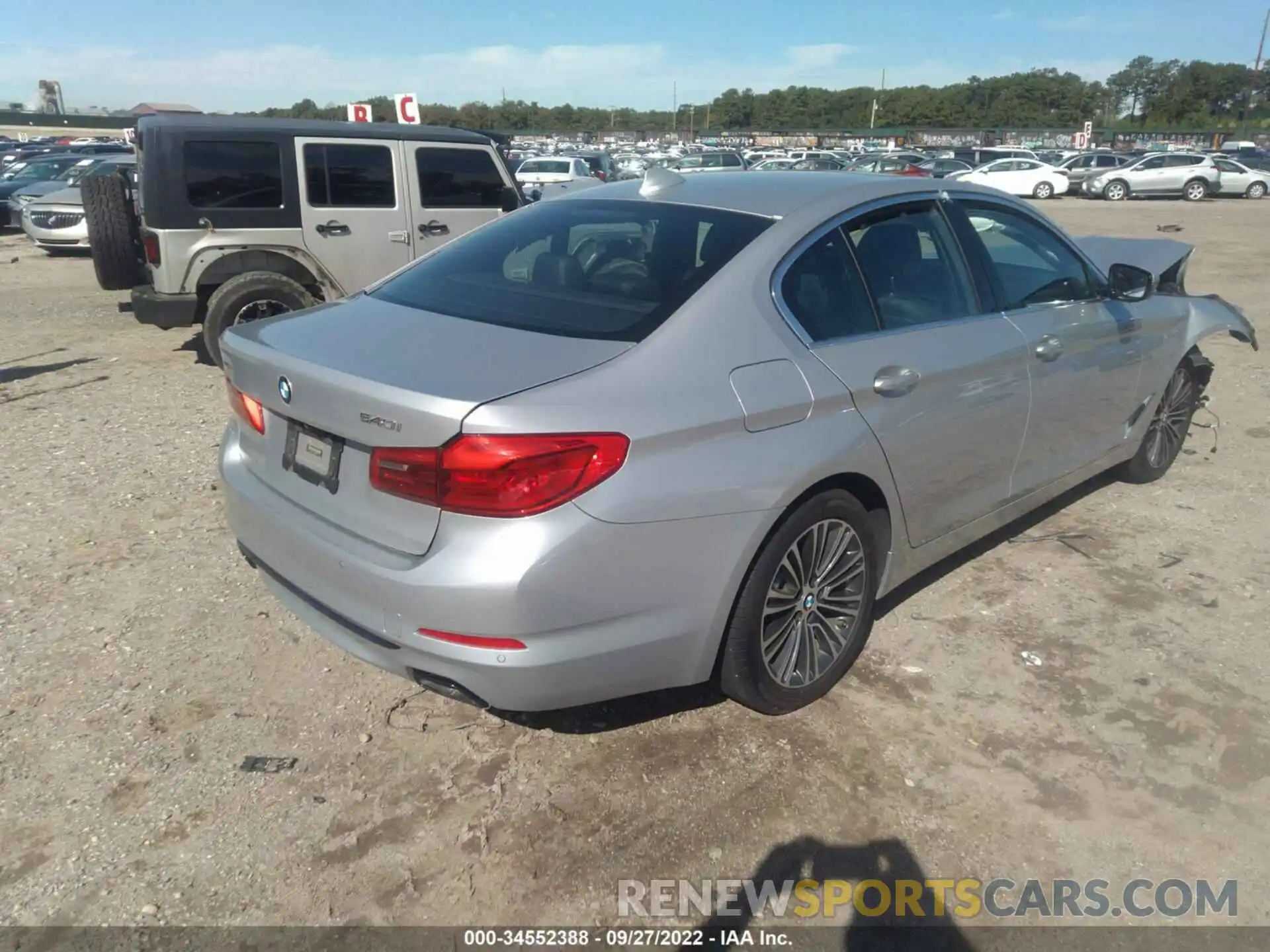 4 Photograph of a damaged car WBAJE7C5XKWW06487 BMW 5 SERIES 2019