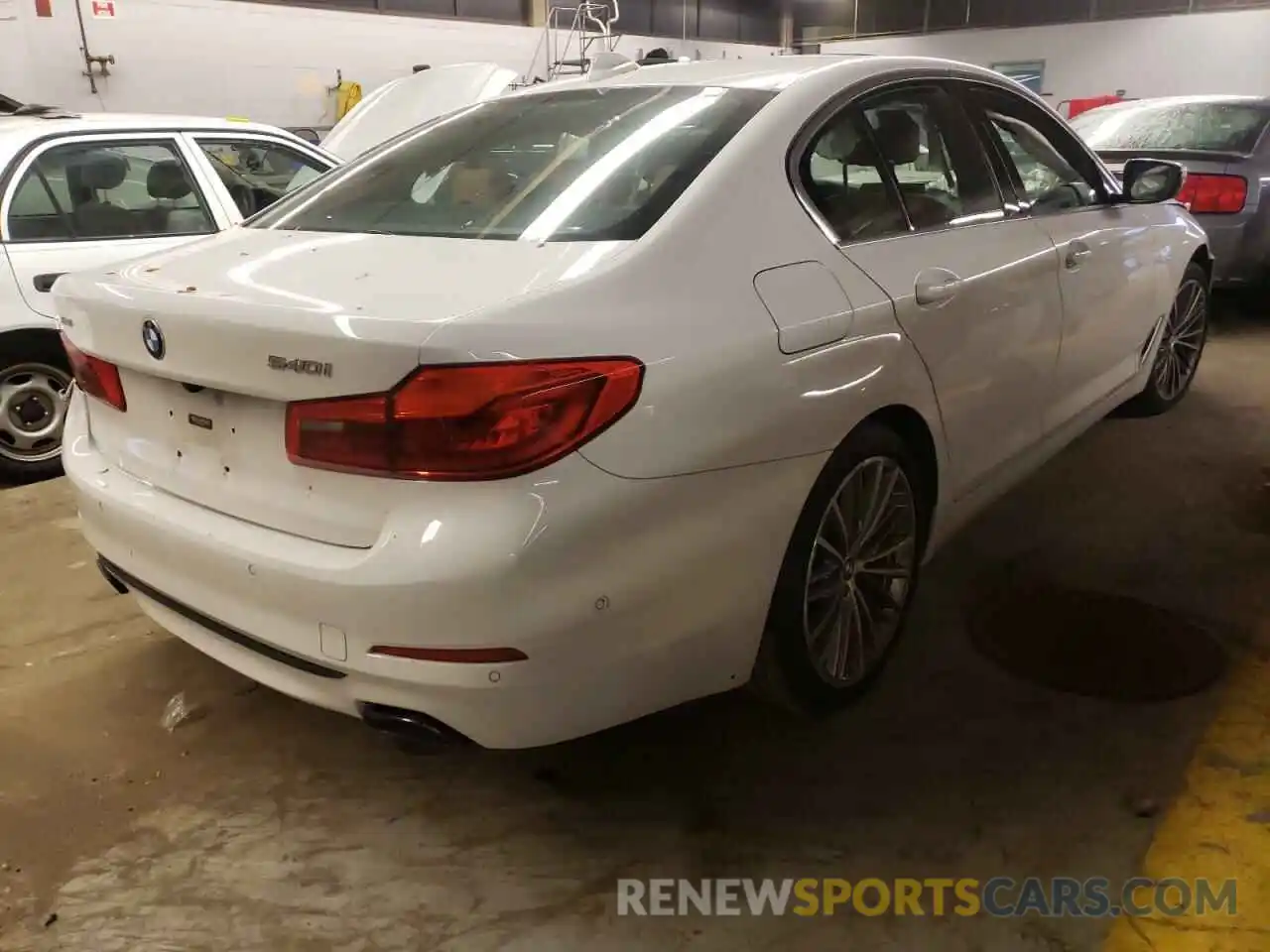 4 Photograph of a damaged car WBAJE7C5XKWW44740 BMW 5 SERIES 2019