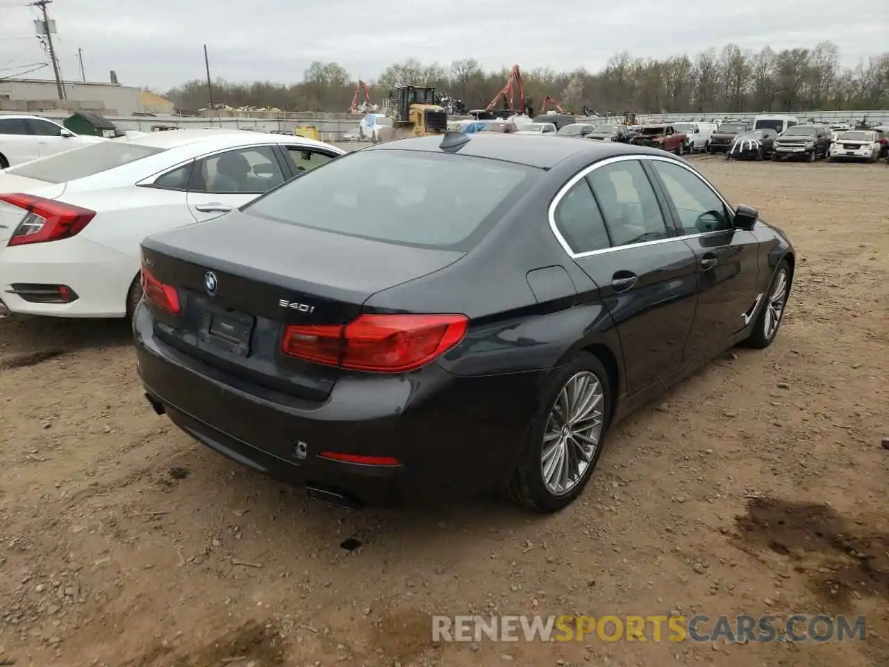 4 Photograph of a damaged car WBAJE7C5XKWW44818 BMW 5 SERIES 2019